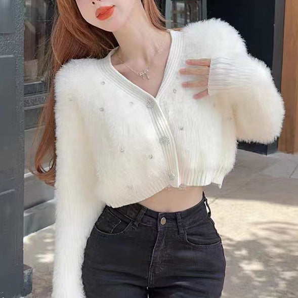 Kvinders fluffy cardigan med glitrende detaljer og moderne snit Stilla