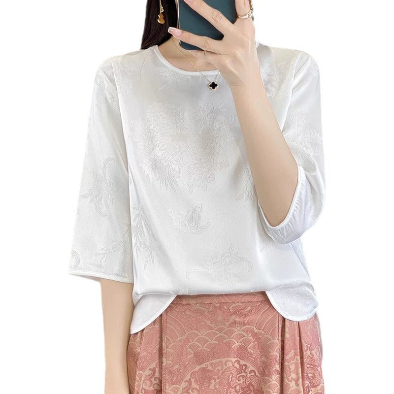 Damebluse med elegant broderi og fin struktur Stilla