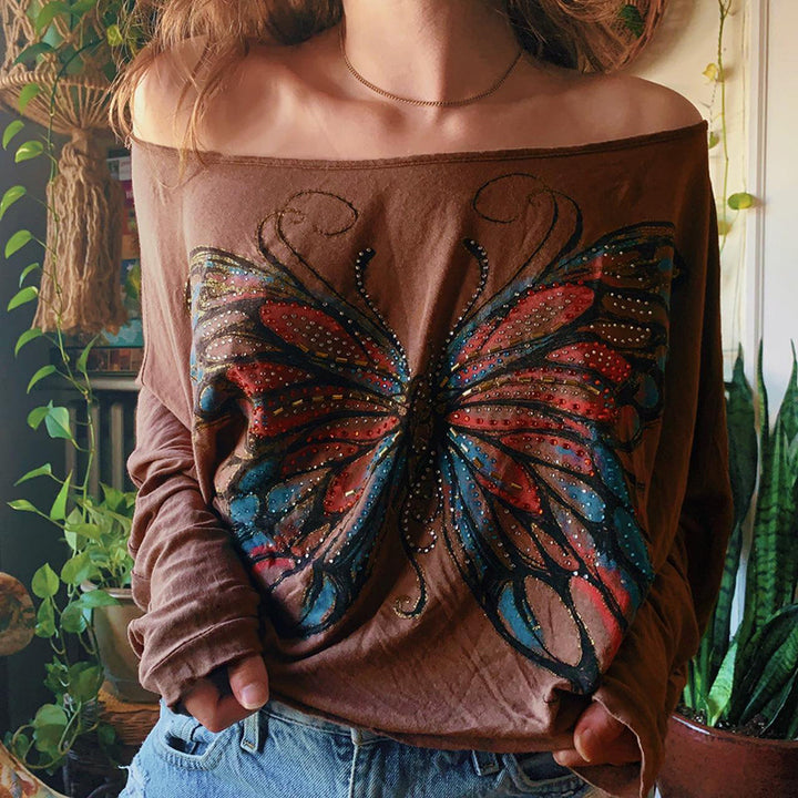 Dame Oversize-T-shirt med flamboyant sommerfugledesign Skovae