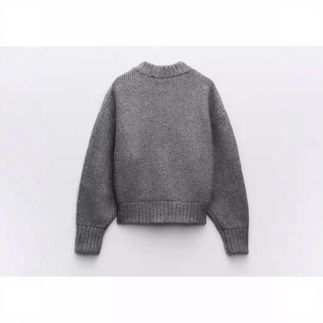 Kvindernes moderne cardigan med voluminøse ærmer og lynlås Stilla