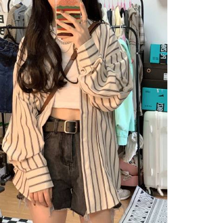 Kvinders stribede overshirt bluse i en afslappet pasform med oversized ærmer