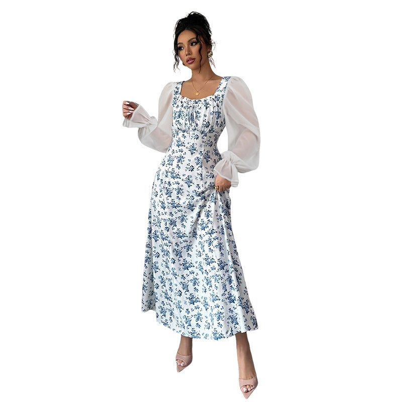 Dame Maxikjole med transparente pufærmer og blomsterdesign Stilla