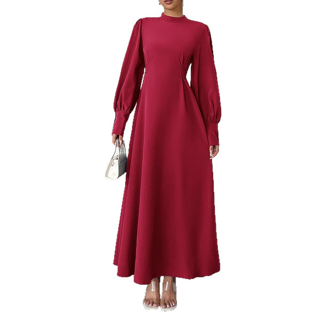Dame maxikjole med elegante pufærmer og figursyet silhuet Stilla