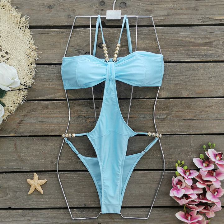 Dame one-piece badedragt med unikt cut-out design og glamorøse dekorationer Stilla