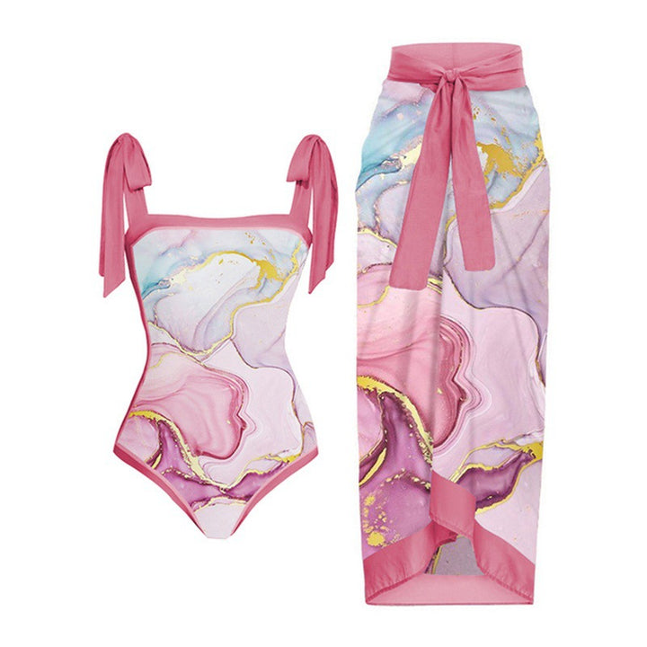 Dame one-piece badedragt med elegant indpakningsskørt og modige remme Skovae