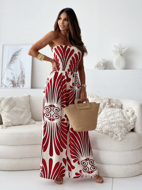 Damer bredskåret jumpsuit med stropløs design og elegant mønster Stilla