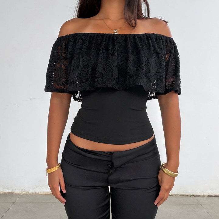 Dameoberdel med spidsel-overlap og off-shoulder design Skovae