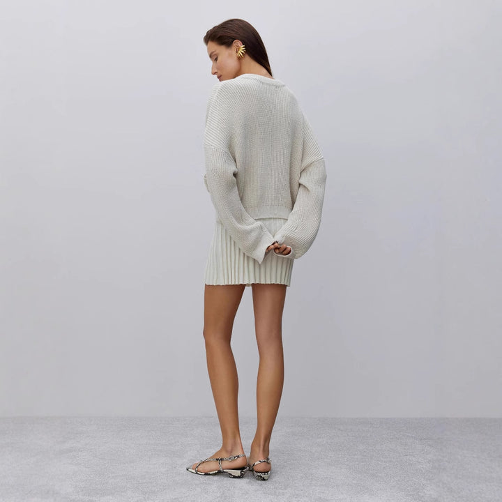 Dame strikpullover med innovative blomsterapplikationer Stilla