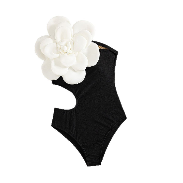 Dame heldragt badedragt med asymmetrisk design og floral accent Stilla