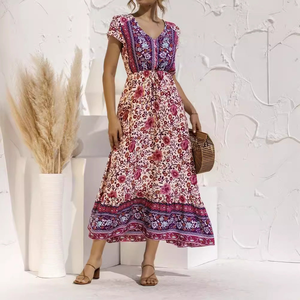 Dame maxikjole med florale mønstre og elegant taljebind Stilla