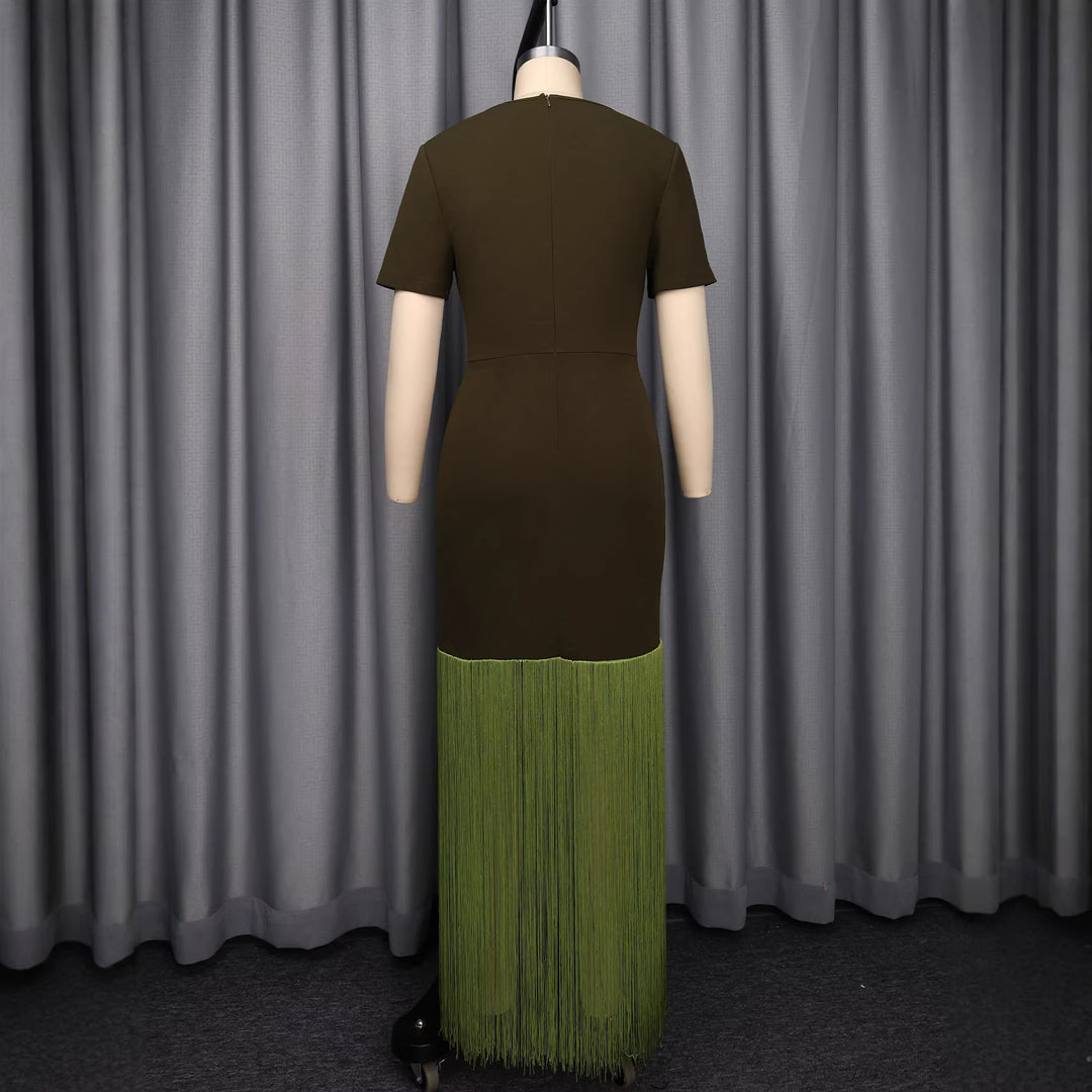 Dame maxikjole med asymmetrisk søm og elegant cut-out design Skovae