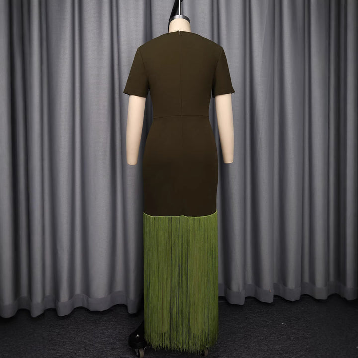 Dame maxikjole med asymmetrisk søm og elegant cut-out design Skovae