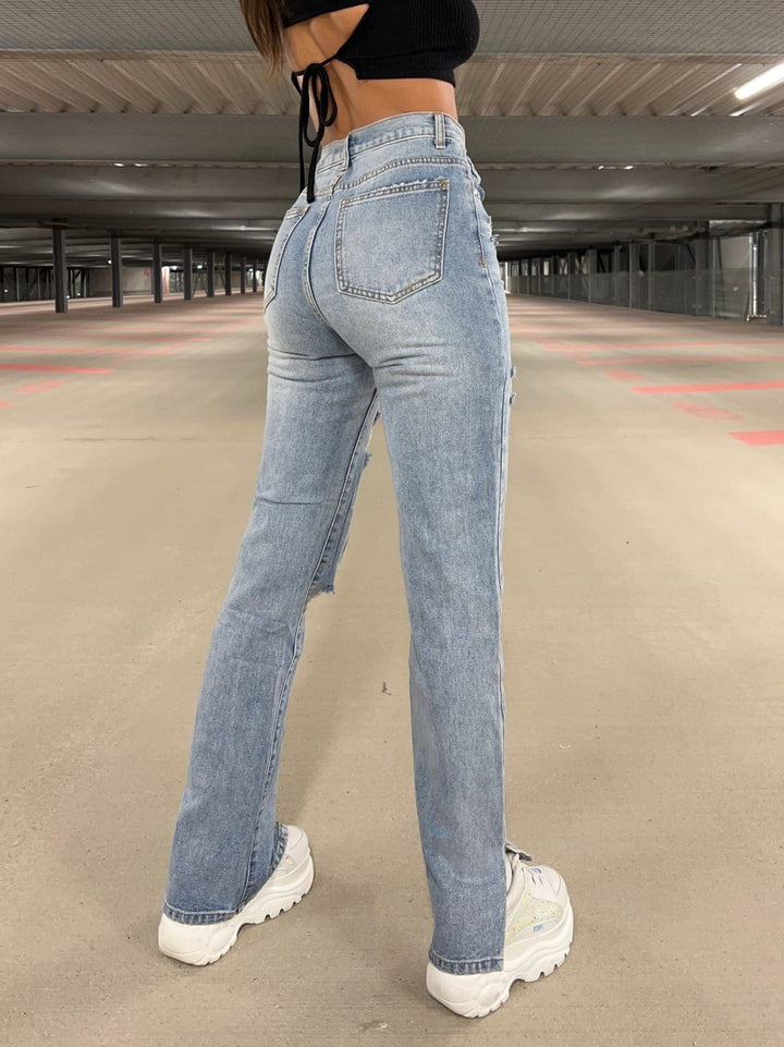 Dame jeansbukser med trendy destroyed-effekt og sidelæg Stilla
