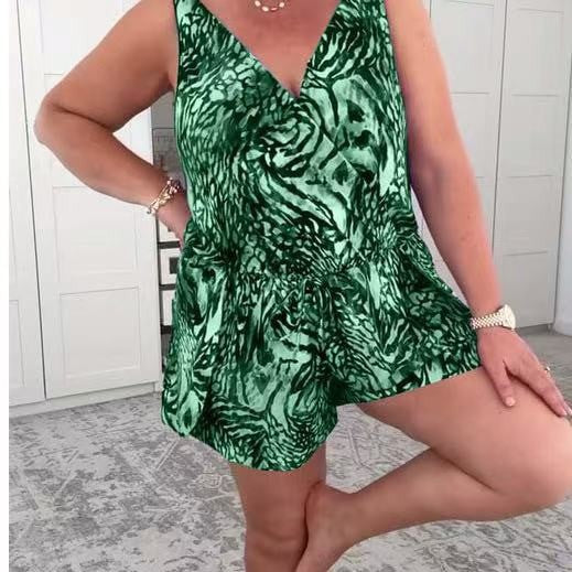 Dame afslappet jumpsuit med farverigt dyremønster Skovae