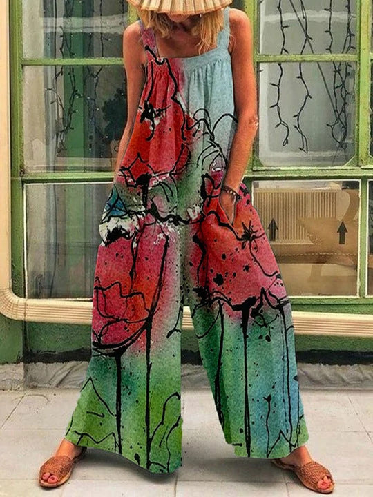 Kvinde luftig Jumpsuit med farverigt blomsterprint og praktiske sidelommer Stilla