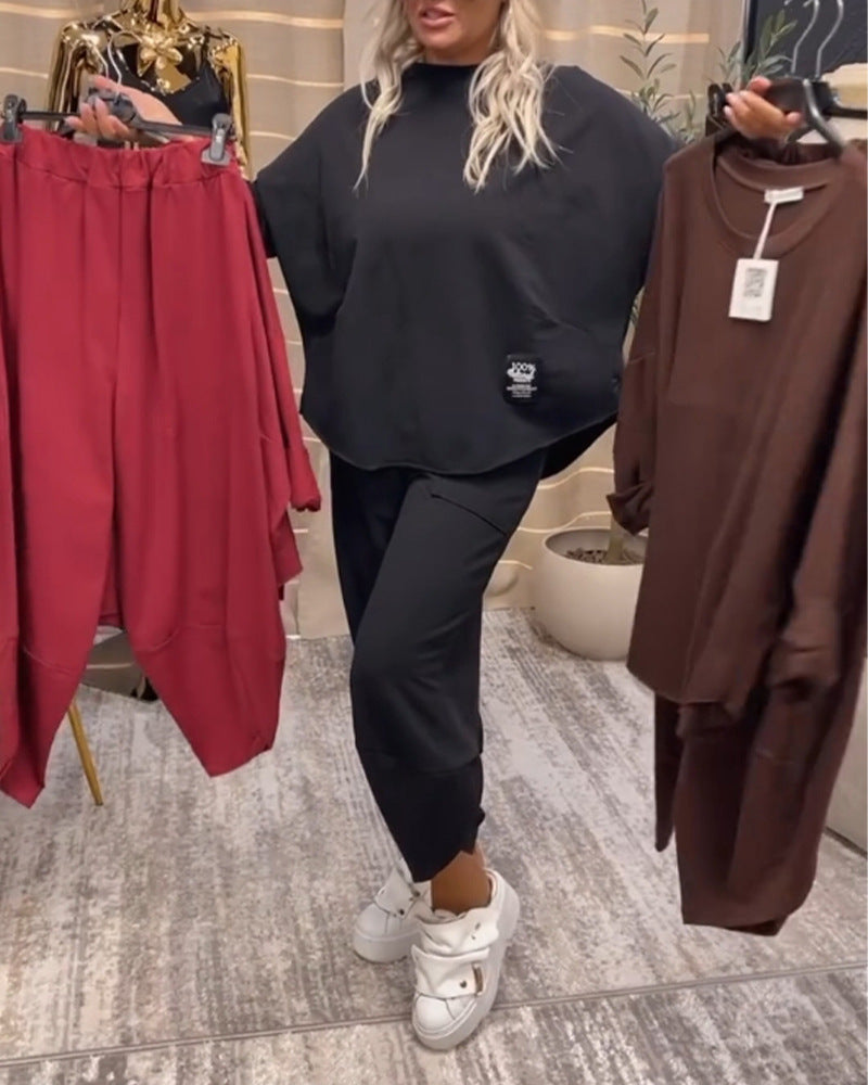 Dame nan Lounge-Sæt bestående af Oversize-Cape-Sweatshirt og konisk Jogpant Skovae