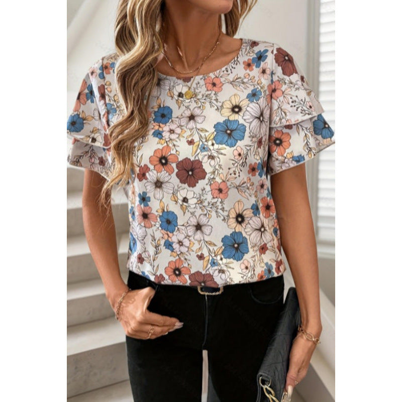 Dame kortærmet bluse med flæser og blomsterprint Skovae