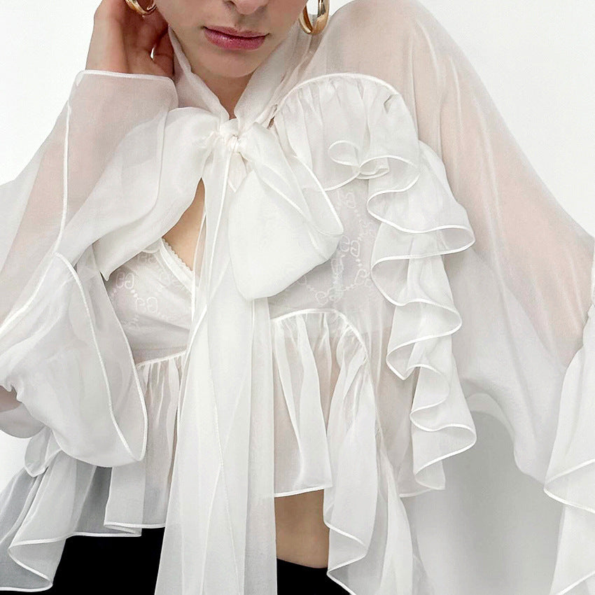 Dame Transparent Rynkebluse med voluminøse ærmer og elegant design Stilla