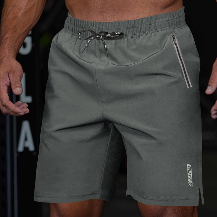 Herrer sportsshorts med sidelommer med lynlås og elastisk talje Stilla
