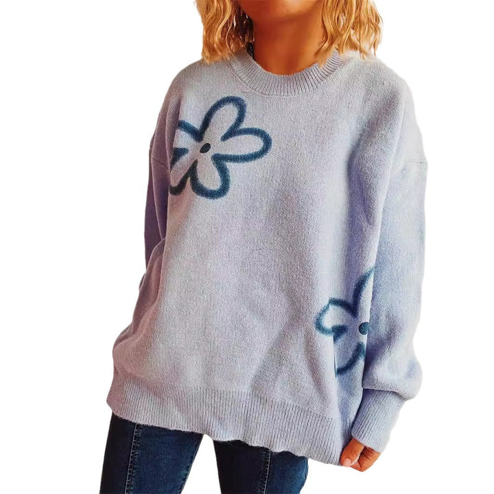 Kvindernes afslappede striktrøje med blomstermotiv og oversized pasform Stilla
