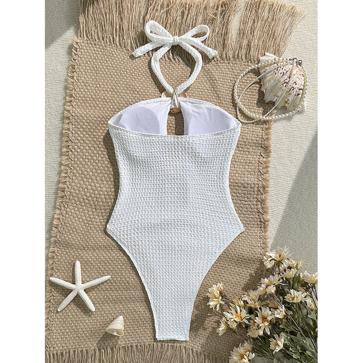 Dame badedragt med raffineret cut-out-design og gyldne accenter Skovae