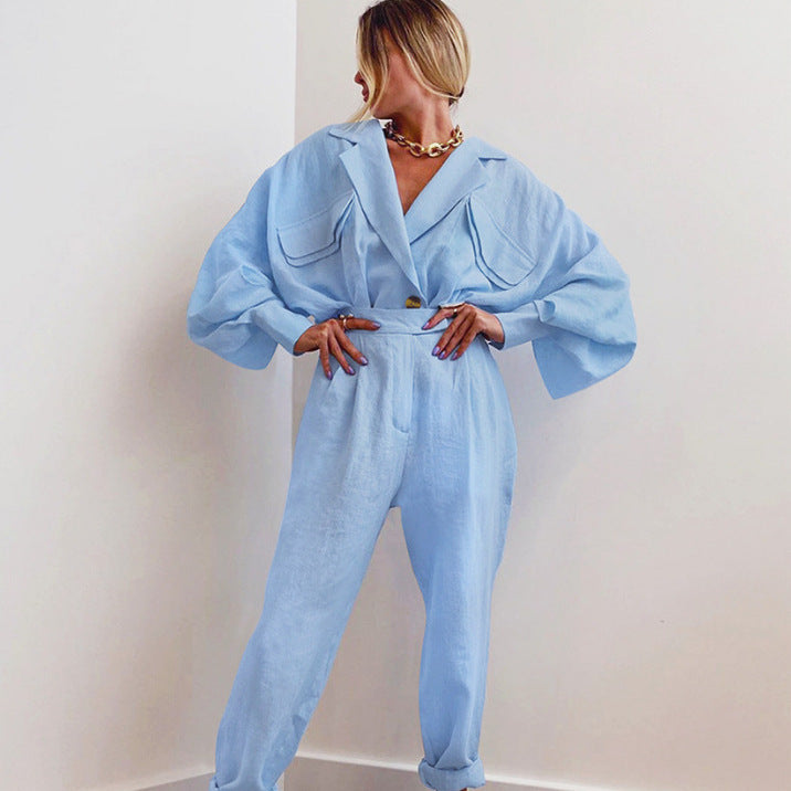 Kvindernes fashionable linned jumpsuit med voluminøse ærmer og elegant bælte Stilla