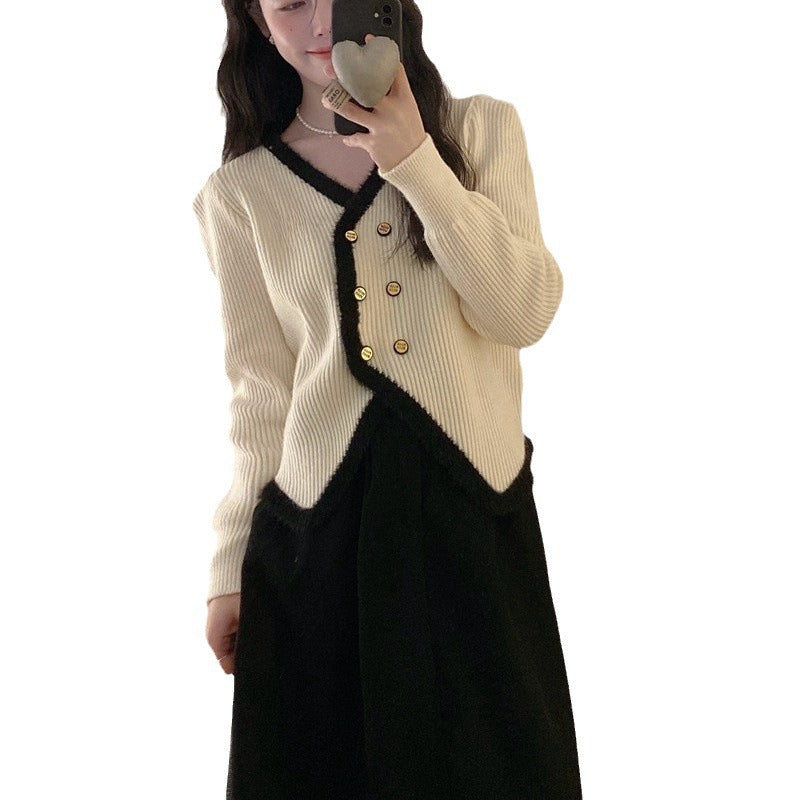Kvindernes elegante cardigan med kontrastkant og knapdetaljer Stilla