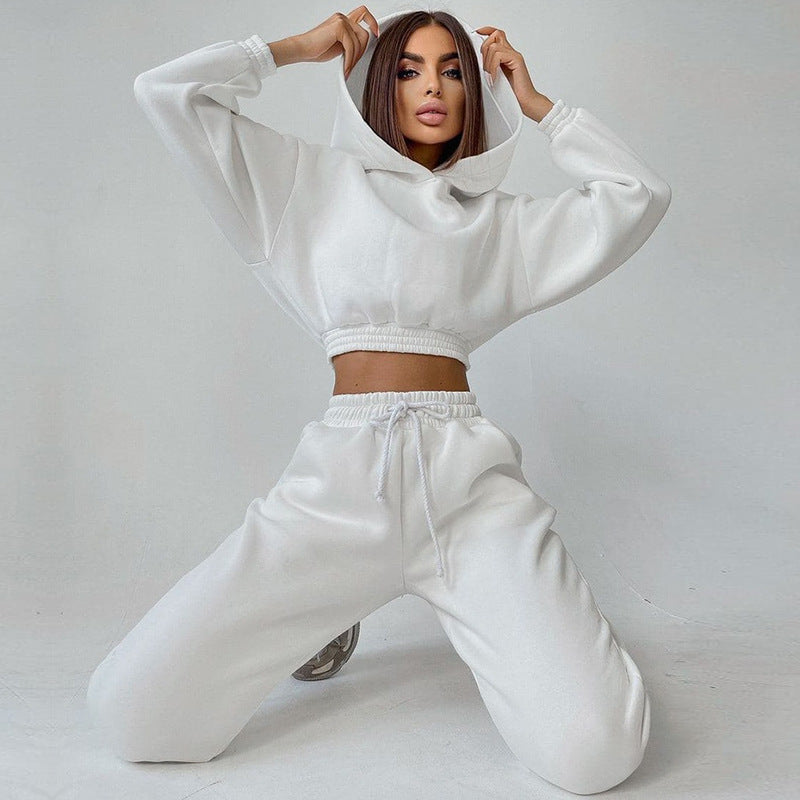 Kvinders sporty cropped sweat sæt med elastisk talje og praktiske lommer