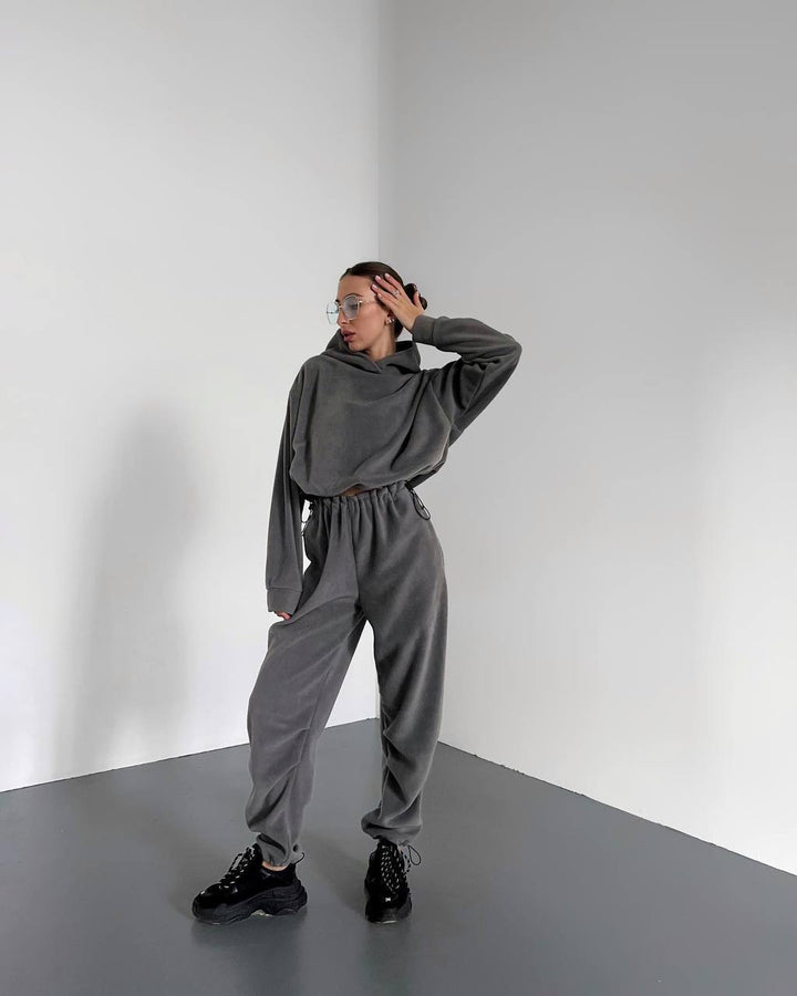Kvindernes komfortable fleece jumpsuit med hætte og elastisk talje