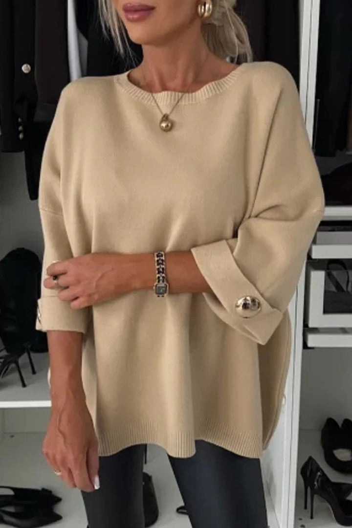 Damer mode oversized sweater med elegante knapdetaljer Stilla