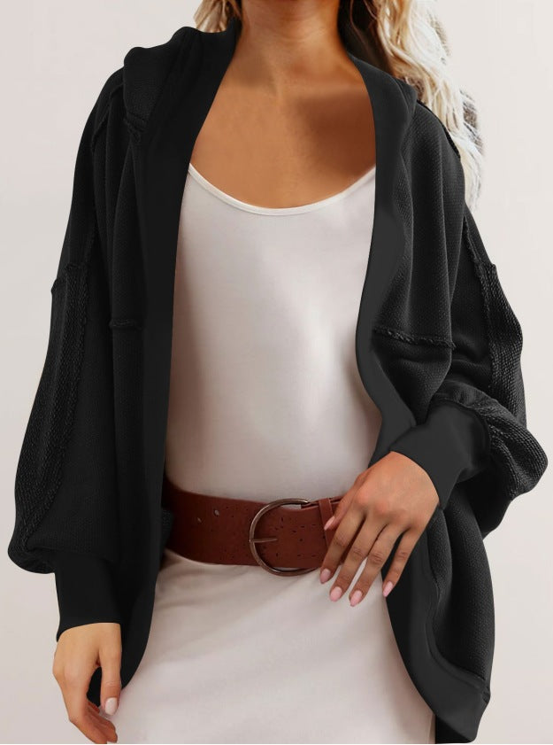 Dame casual oversized hoodie med åben front og luftige ærmer Stiila