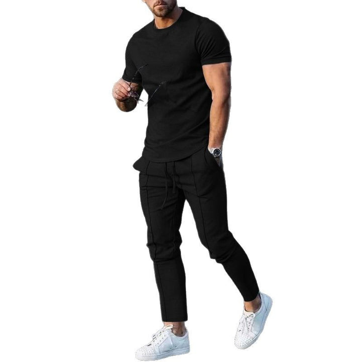 Herrer afslappet sport outfit med åndbart T-shirt og løs joggingbukser Stilla