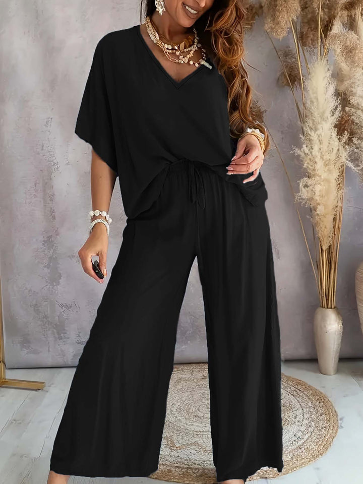 Dame afslappet jumpsuit med bred pasform og elastisk talje Stilla