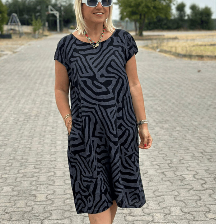 Dame knælang A-linie-midi kjole med struktureret jacquard-look og rund halsudskæring Skovae