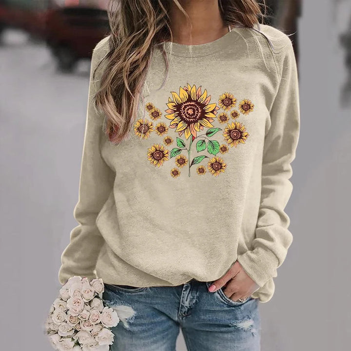 Kvinders sweatshirt med florale solsikke motiver og behagelig pasform Stilla