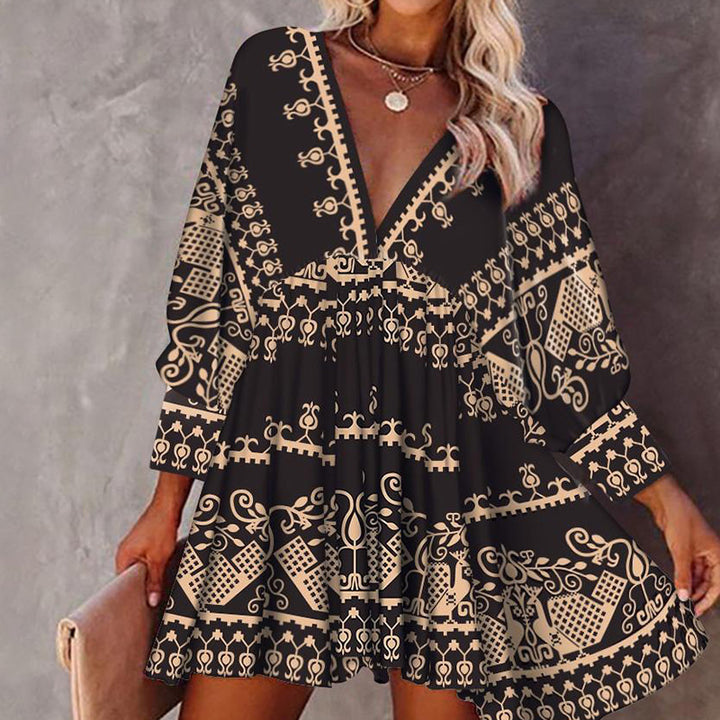 Dame Midikjole med dyb V-udskæring og iøjnefaldende trykdesign Stilla