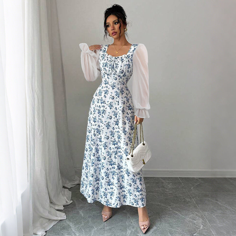 Dame Maxikjole med transparente pufærmer og blomsterdesign Stilla