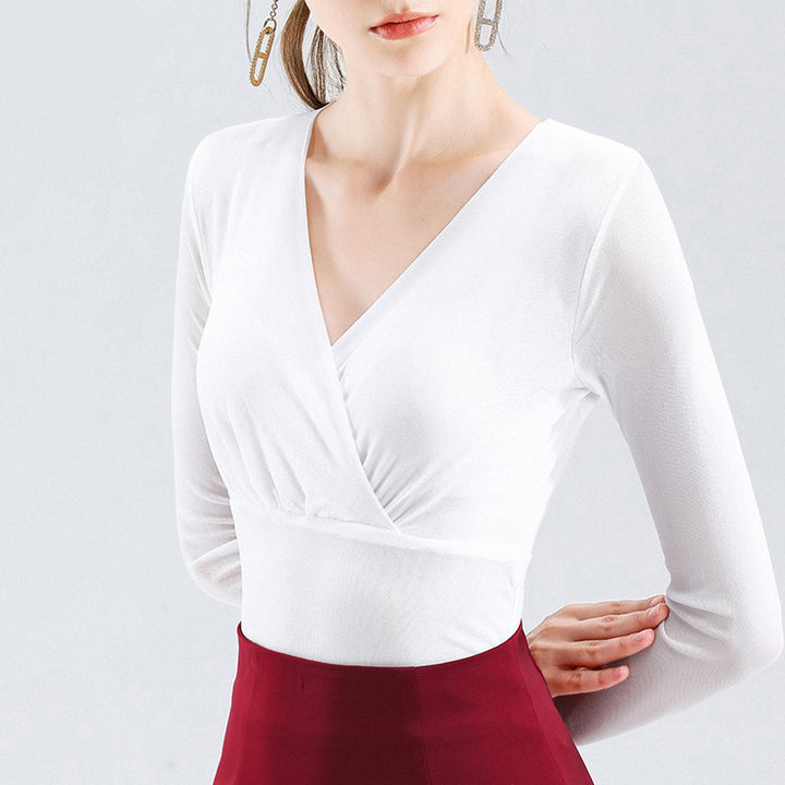 Dame indpakningsbluse med elegant stofstruktur og feminin V-hals Stilla