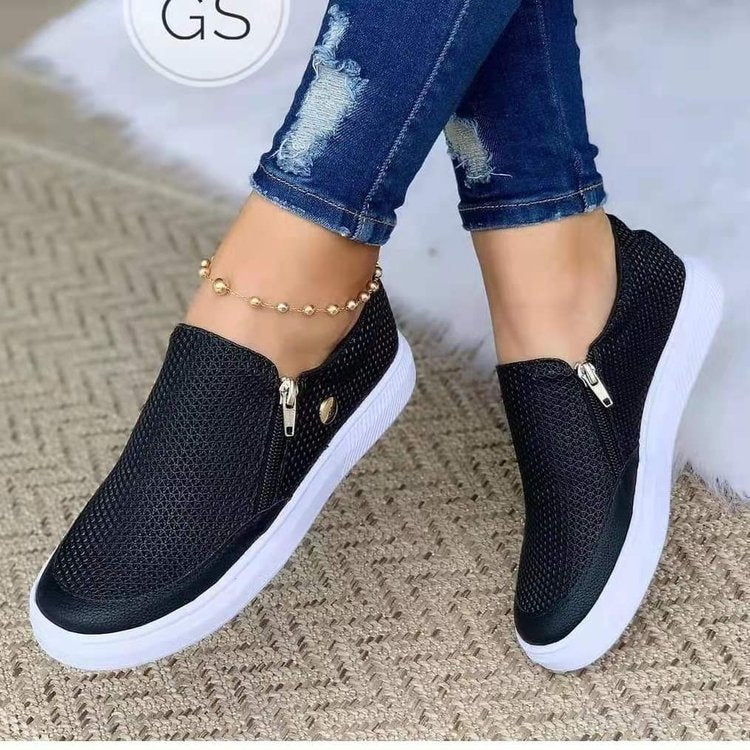 Dame Slip-On Sneakers med fashionable lynlåsdesign og åndbart overflade Stilla