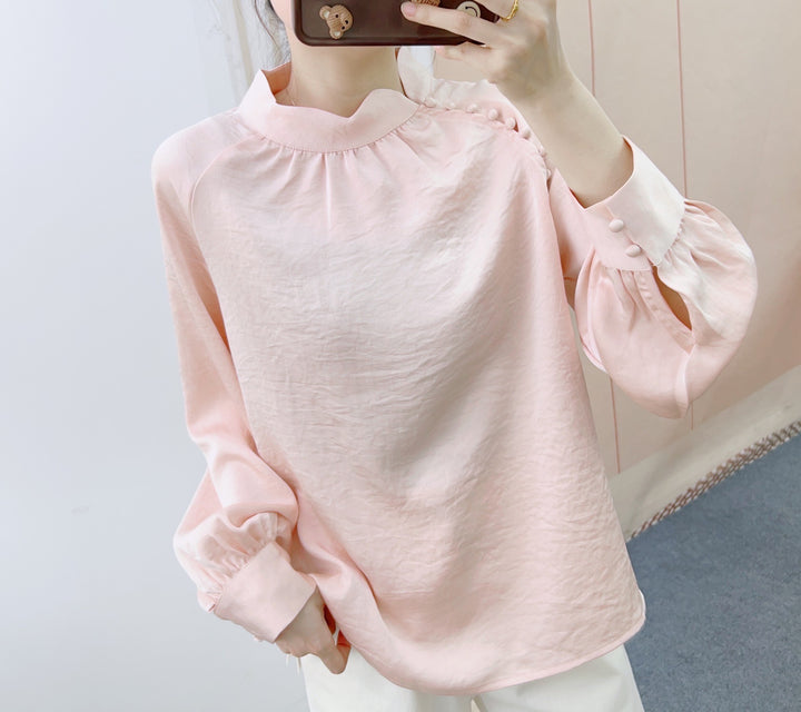 Damebluse med dekorative puffærmer og elegant ståkrave Stilla