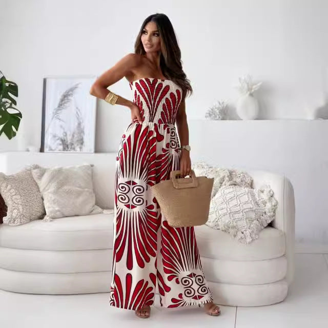 Damer bredskåret jumpsuit med stropløs design og elegant mønster Stilla