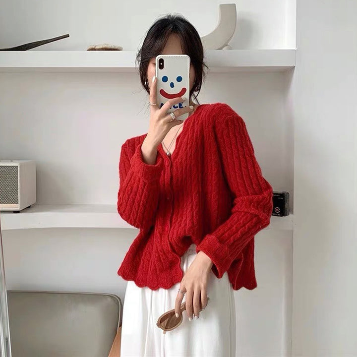 Kvindernes cardigan med struktureret kabelmønster og elegante knapdetaljer Stilla