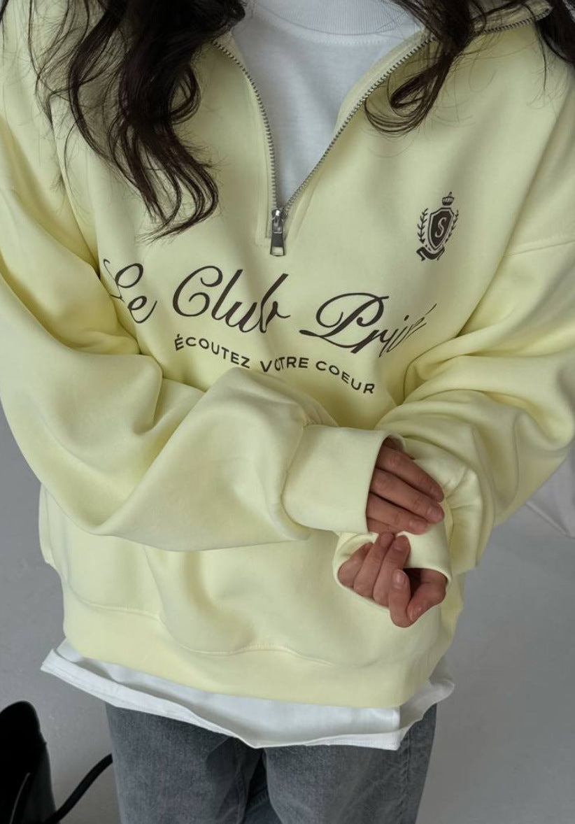 Kvinders afslappede pullover med halv lynlås og grafisk print Stilla