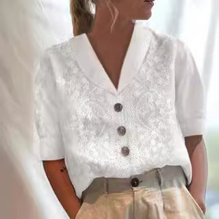 Damebluse med blomsterbroderier og klassisk krave Stilla