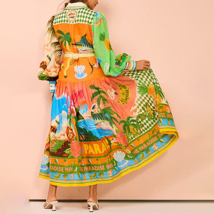 Kvinders lang kaftan kjole med farverig print og elegante pufærmer Stilla