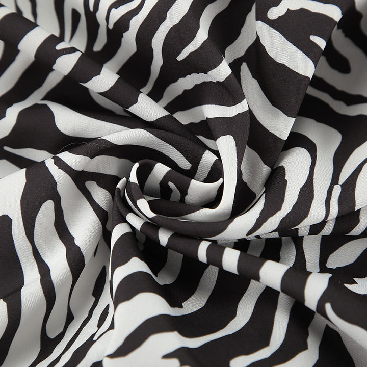 Dame elegant ensemble med zebra-print og talje-knude Stilla