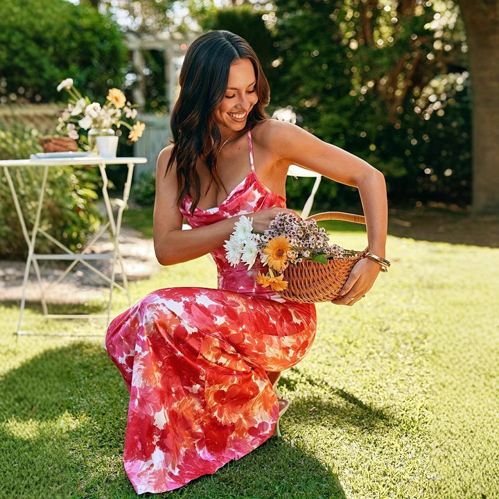 Dame Elegant sommerkjole med cut-out-detaljer og blomsterdesign Stilla