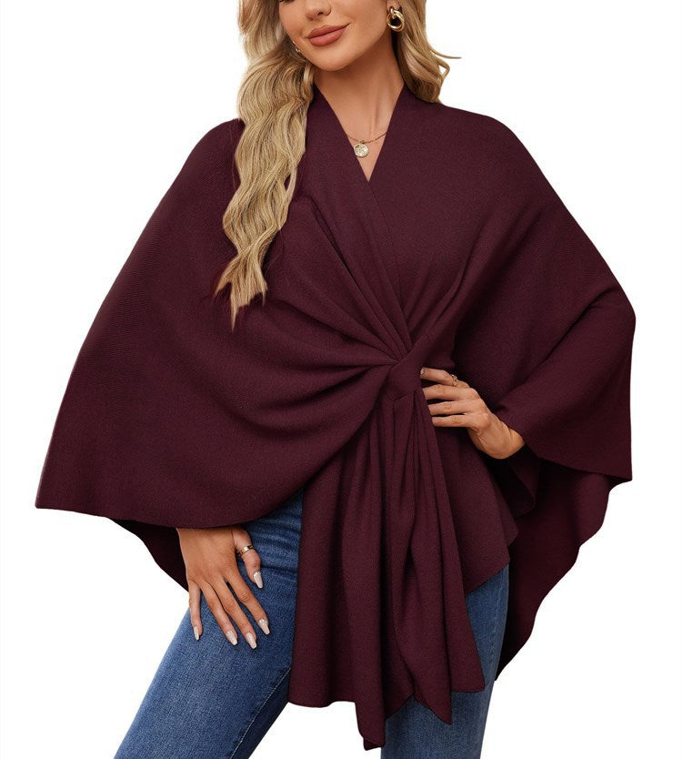 Dame elegant strikkeponcho med raffinerede draperinger og taljebælte Stilla