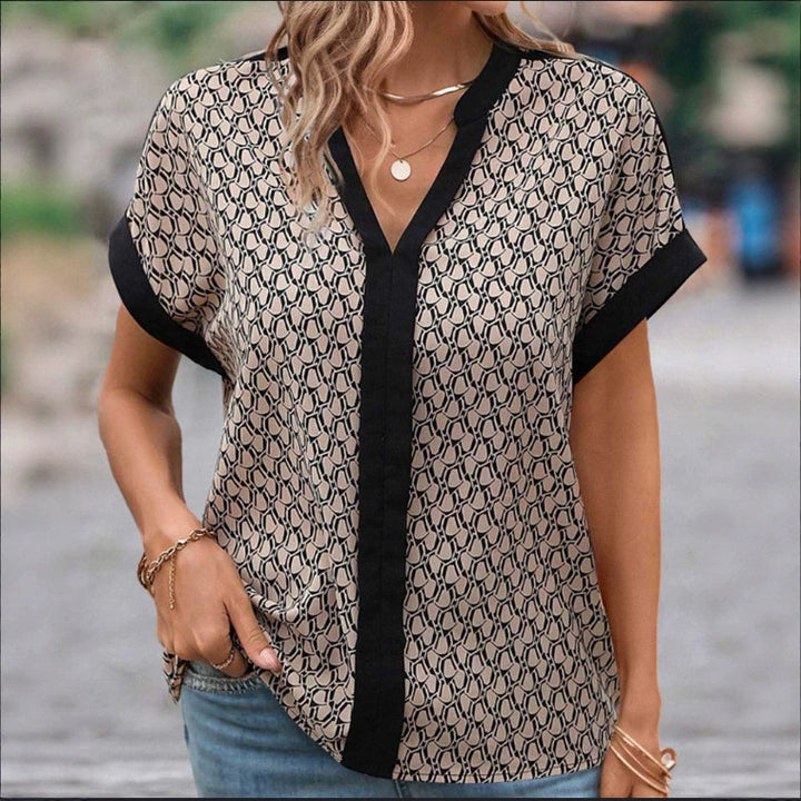 Dame nan let boxy bluse i crepe-look med V-udskæring og kontrastpaspel Skovae