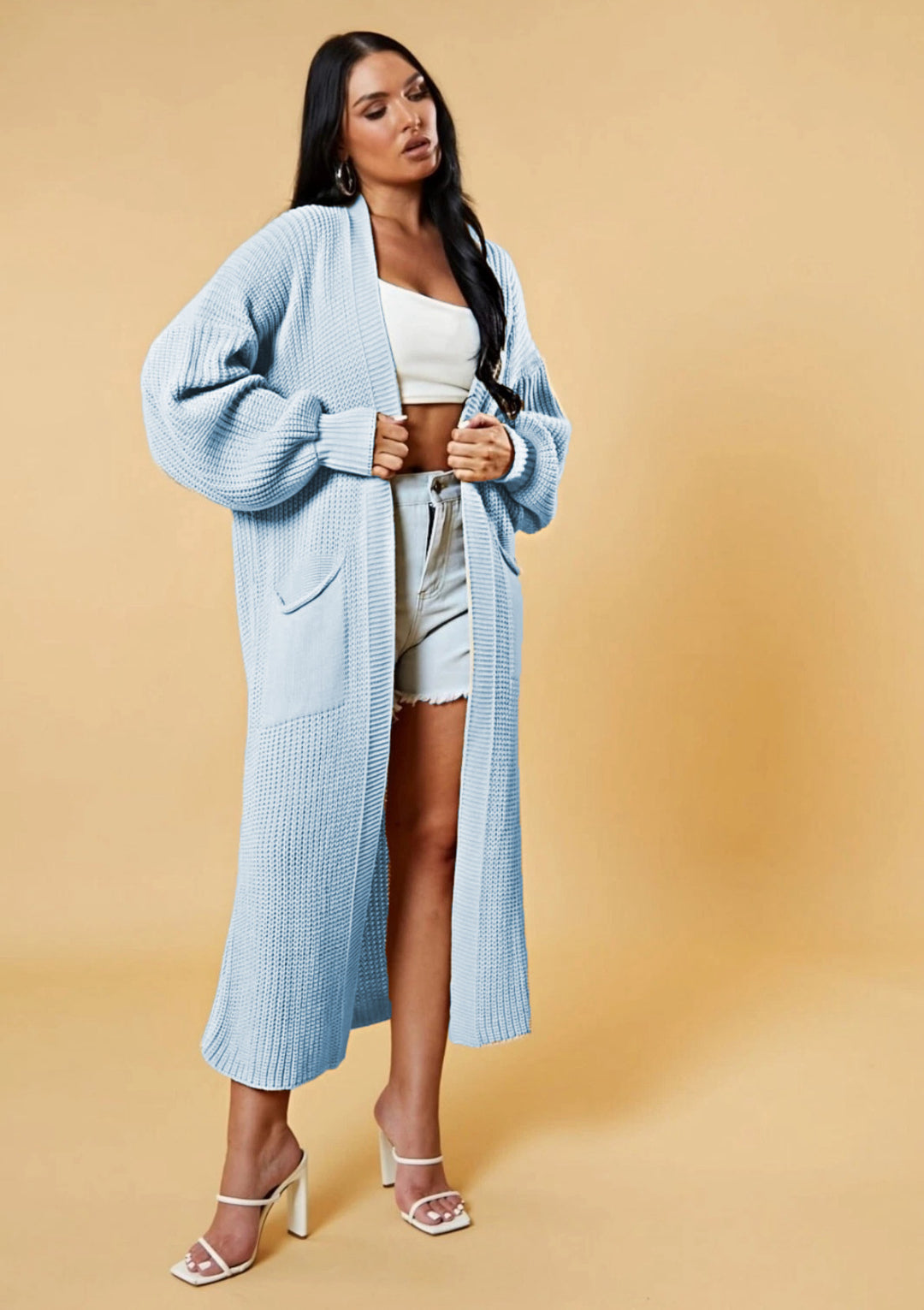 Kvinders lange strikket cardigan med åbent design og praktiske lommer Stilla